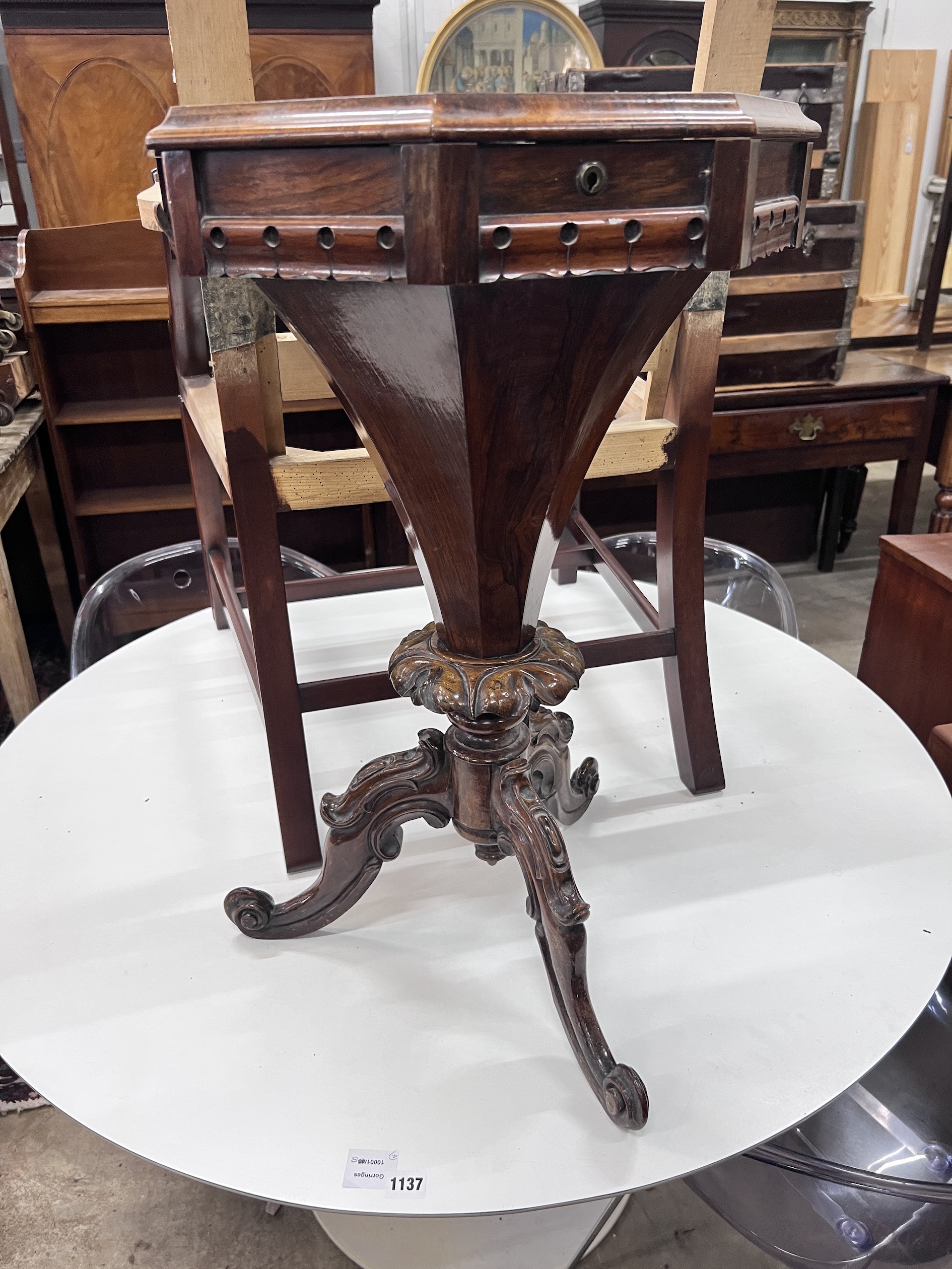 A Victorian octagonal rosewood trumpet work table, width 44cm, height 74cm